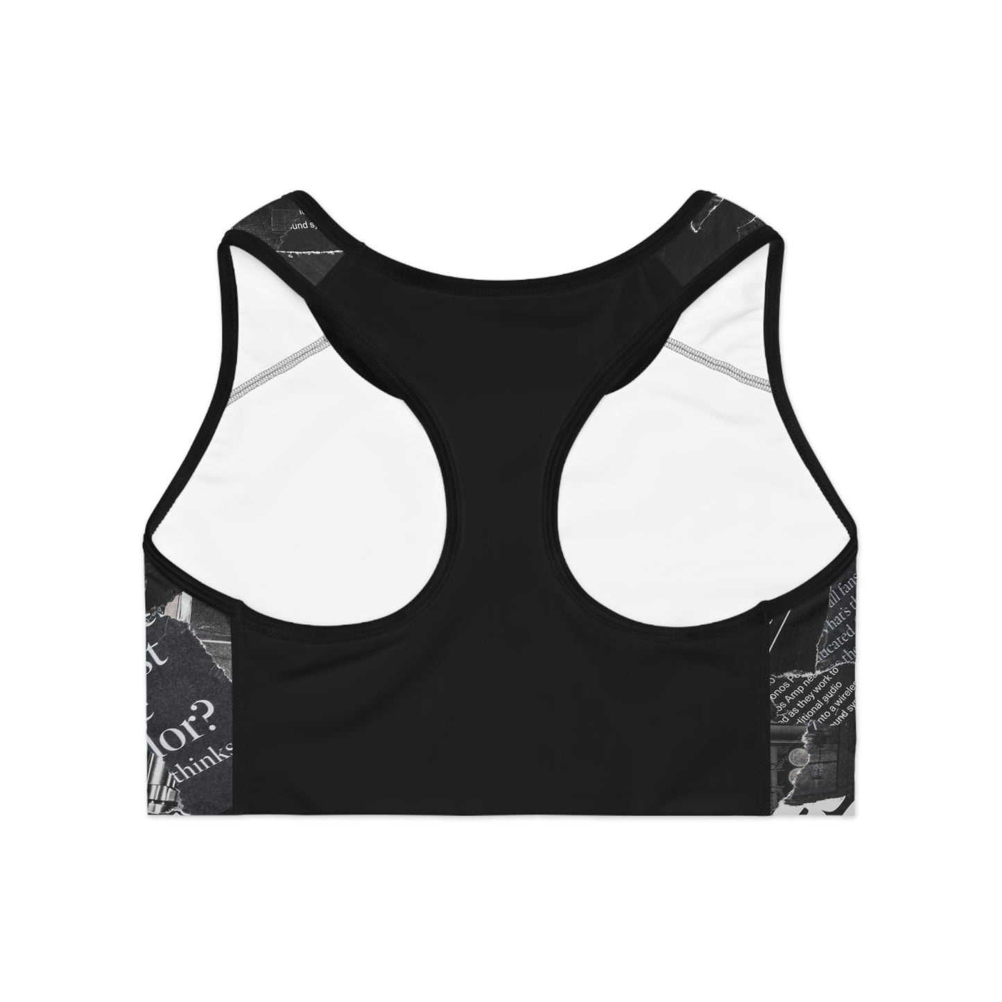 Back view of black and white magazine sports bra featuring racerback style and breathable fabric