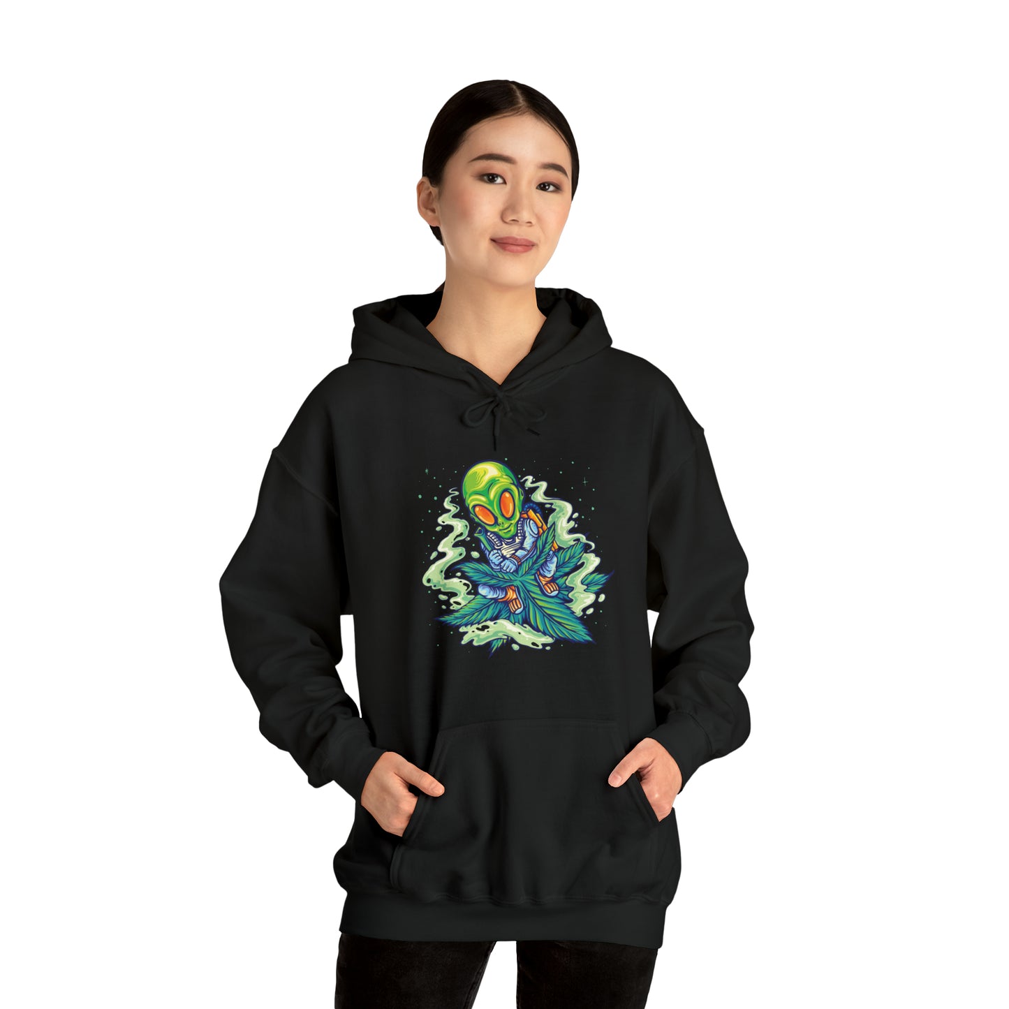 Alien Flying On Cannabis Leaf Unisex Heavy Blend Hoodie