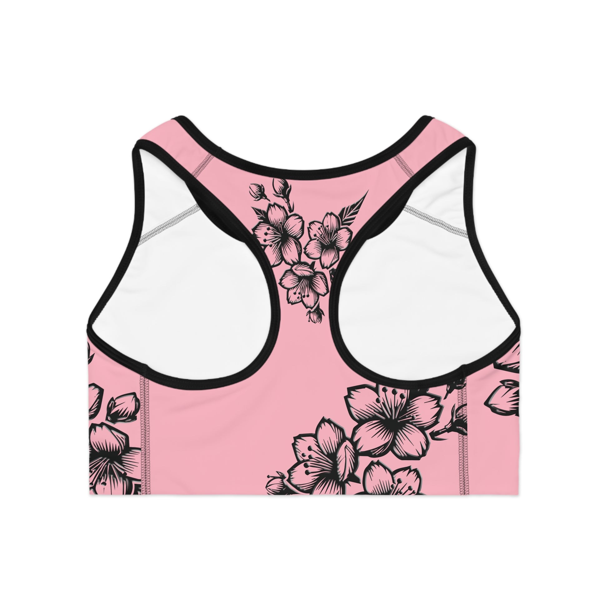 Flat back view of cherry blossom print sports bra showing racerback style and supportive double-layer construction