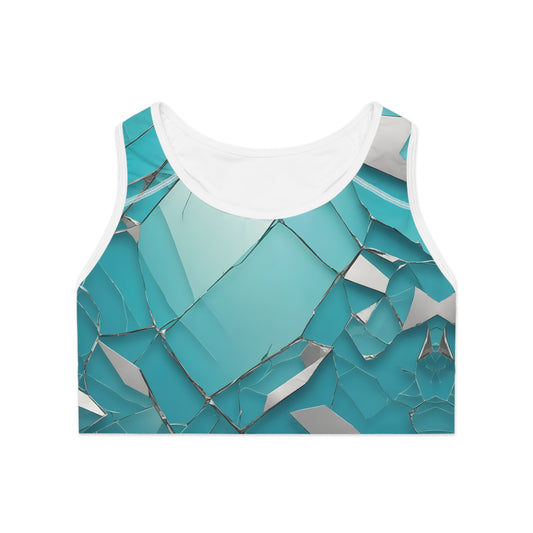Flat front view of blue broken glass pattern sports bra with sharp abstract print and compression band