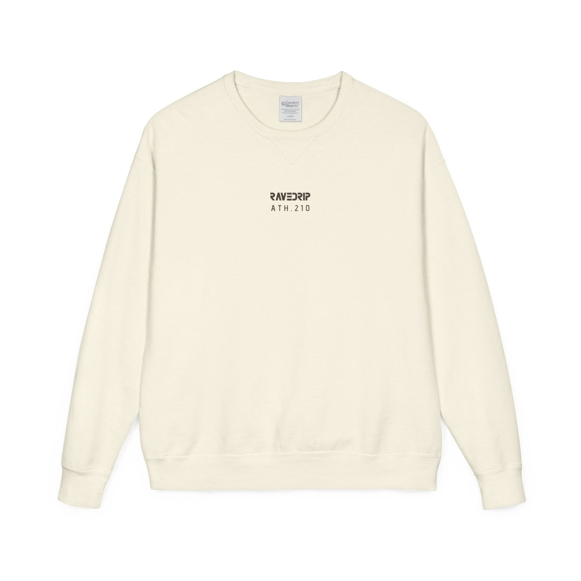 Front view flat lay of the RAVEDRIP Core crewneck sweatshirt in garment-dyed cream featuring a centered washed charcoal ATH.210 logo and V-notch collar detail on a pure white background.
