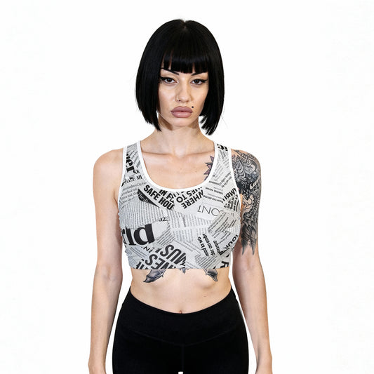 White Magazine Sports Bra – Sleek, Strong, & Statement-Making