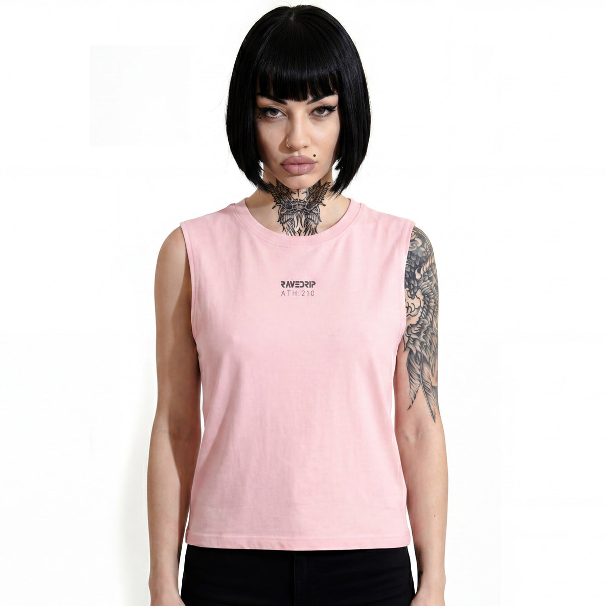 RAVEDRIP Sector 210 Unisex Jersey Muscle Tank in soft pink, premium sleeveless streetwear top featuring charcoal grey ATH.210 technical branding on the chest, worn by alternative female model with black bob haircut