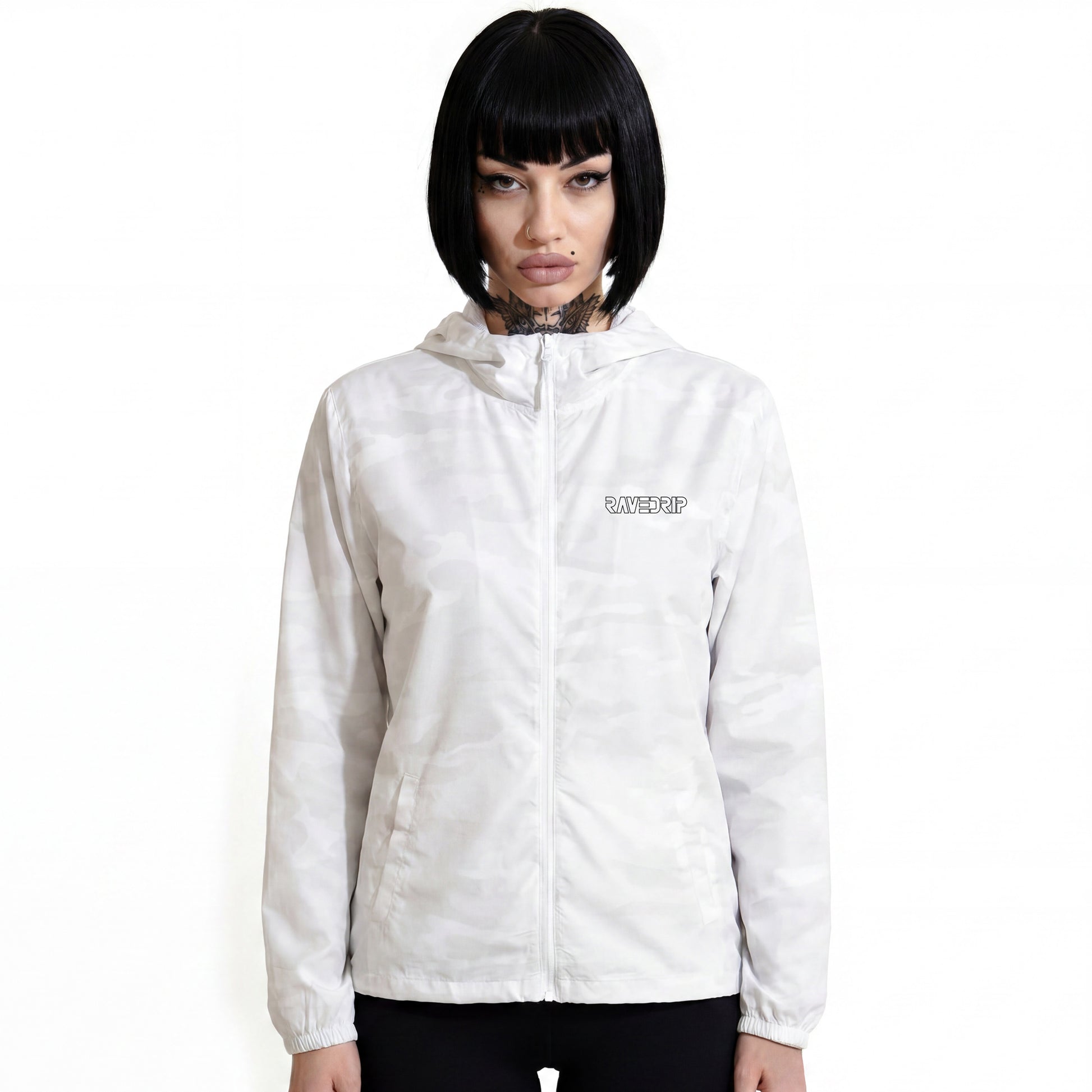 RAVEDRIP Women's Lightweight Windbreaker Jacket in white stealth camouflage, premium techwear wind coat with high scuba collar and black chest logo, worn by alternative female model.