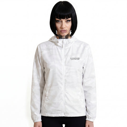 RAVEDRIP Women's Lightweight Windbreaker Jacket in white stealth camouflage, premium techwear wind coat with high scuba collar and black chest logo, worn by alternative female model.