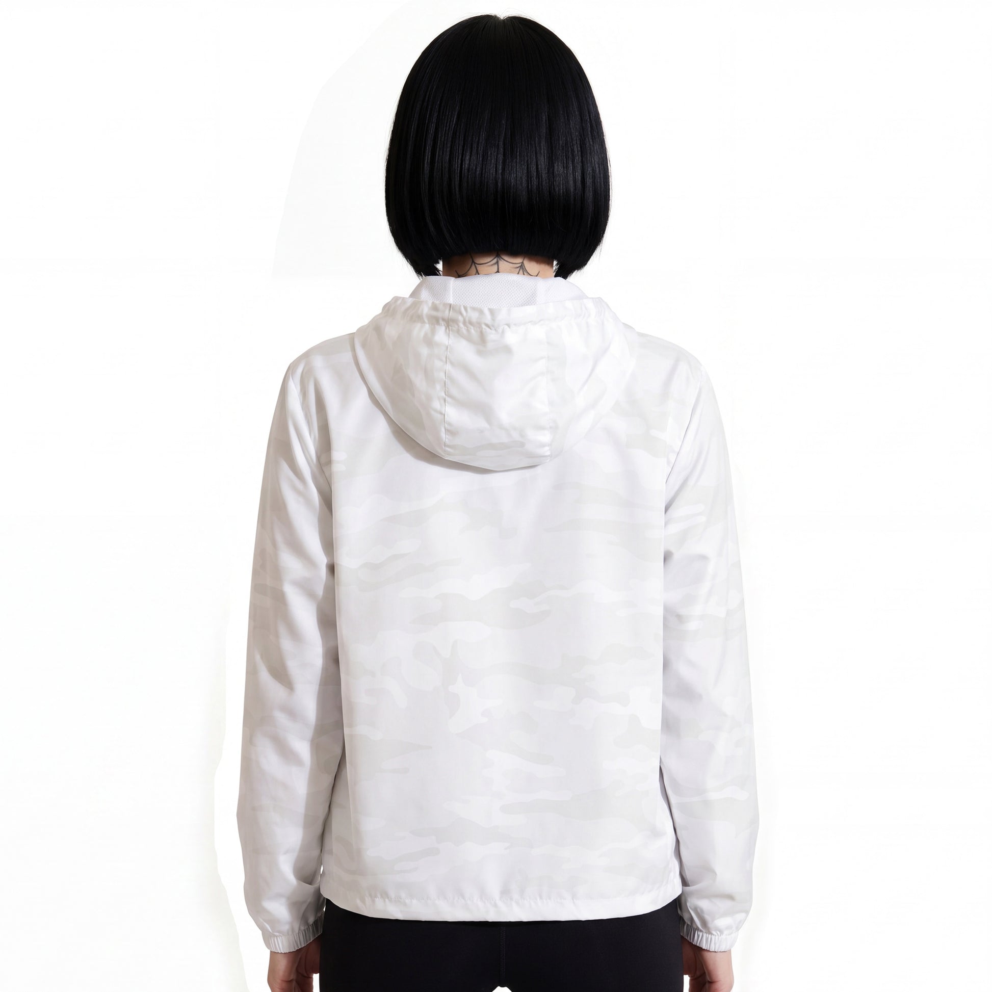 Rear view of RAVEDRIP Women's Lightweight Windbreaker Jacket in white camo pattern, streetwear hooded windproof jacket with loose regular flat waist hem and relaxed integrated hood on shoulders, alternative female model facing away, professional studio fashion photography.