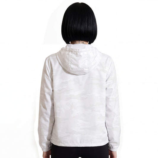 Rear view of RAVEDRIP Women's Lightweight Windbreaker Jacket in white camo pattern, streetwear hooded windproof jacket with loose regular flat waist hem and relaxed integrated hood on shoulders, alternative female model facing away, professional studio fashion photography.